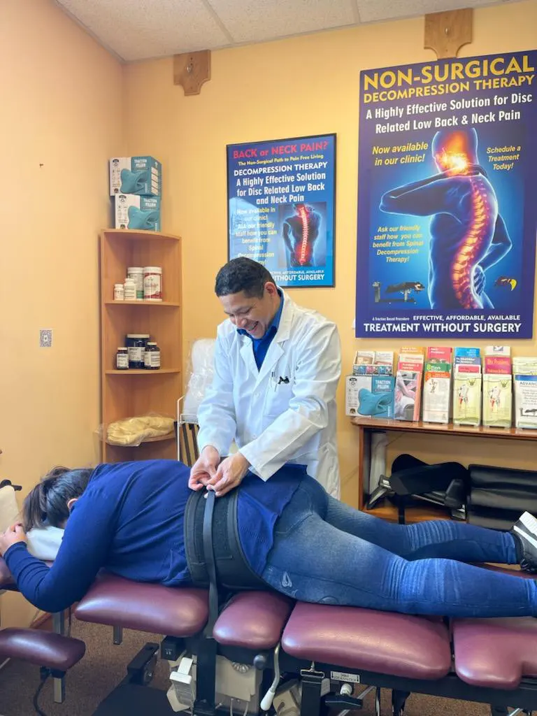Dr. Hugo Torres performing spinal decompression in Ironbound district of Newark NJ